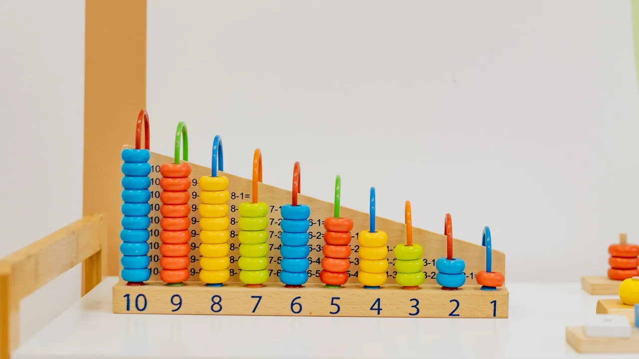 Children exploring counting and sorting toys as part of Cedar Lane's play-based curriculum