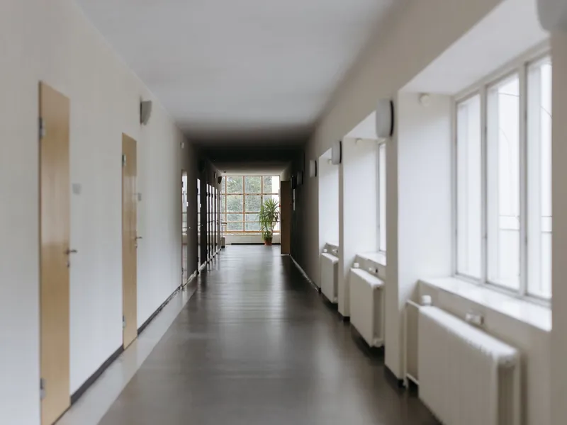 A bright, welcoming hallway at Cedar Lane